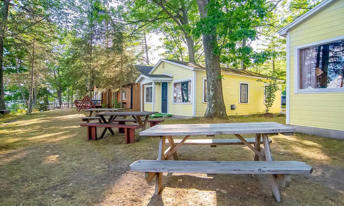 Indian River Cottage | Charming lakefront cottage with large yard, dock, & fire pit - close to downtown