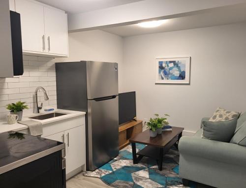 Regina House | Comfortable Two Bed Basement With Free WiFi, Laundry and Private Entry