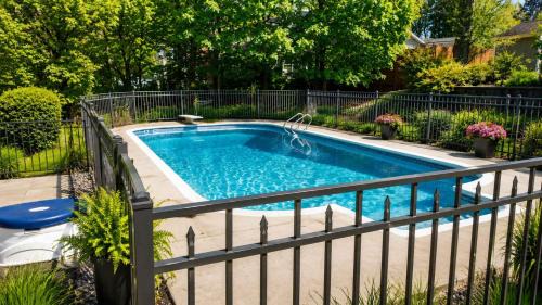 West Irondequoit House | Gorgeous Retreat with Pool Hot Tub and Game Room