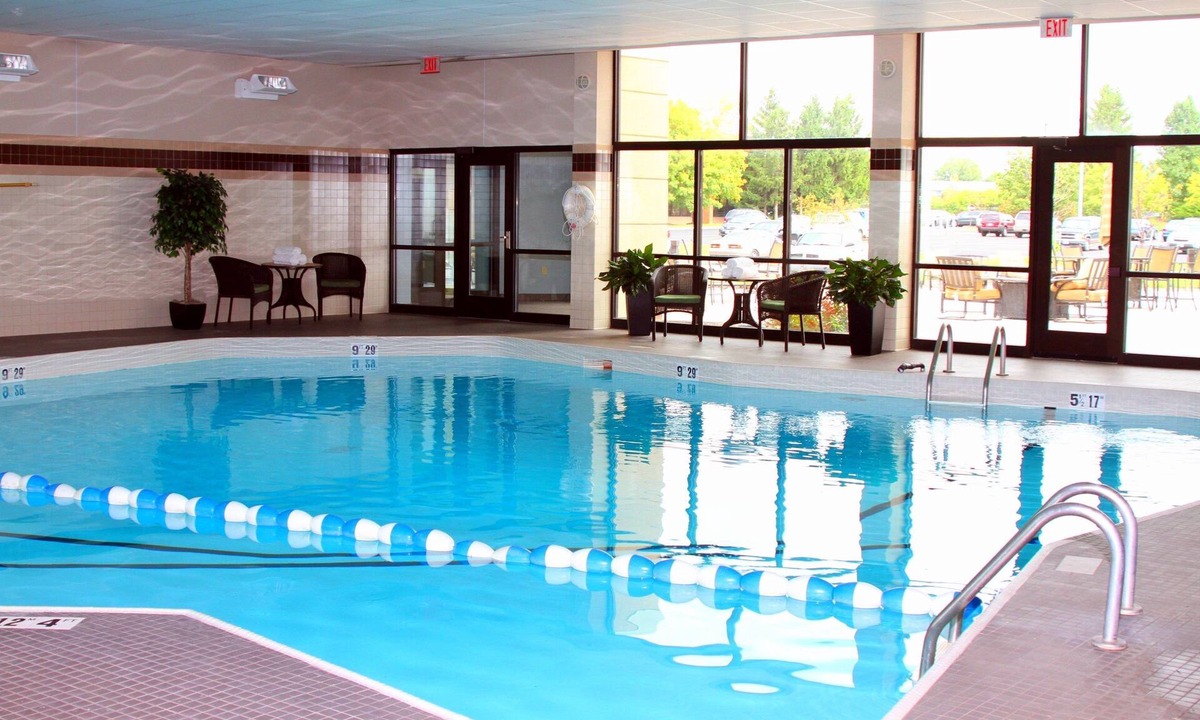 Liverpool Condo | King Suite Near Syracuse University | Free Breakfast + Fitness Center