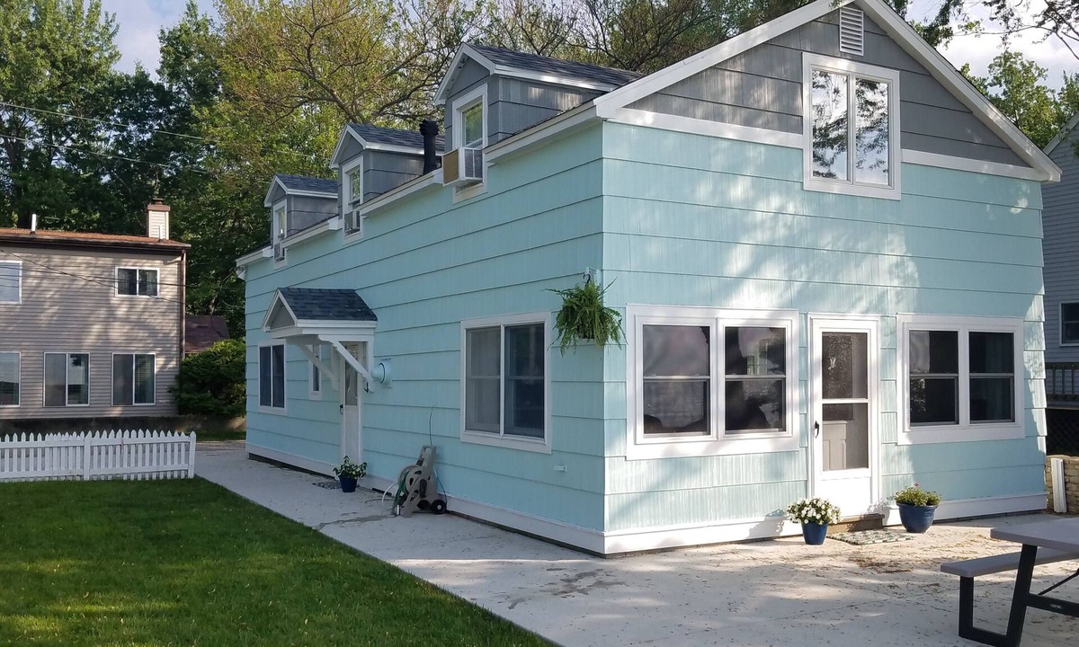 Gypsum House | Lake Front Nautical Themed Home with Private Yard & Sandy Bottom Water Access!