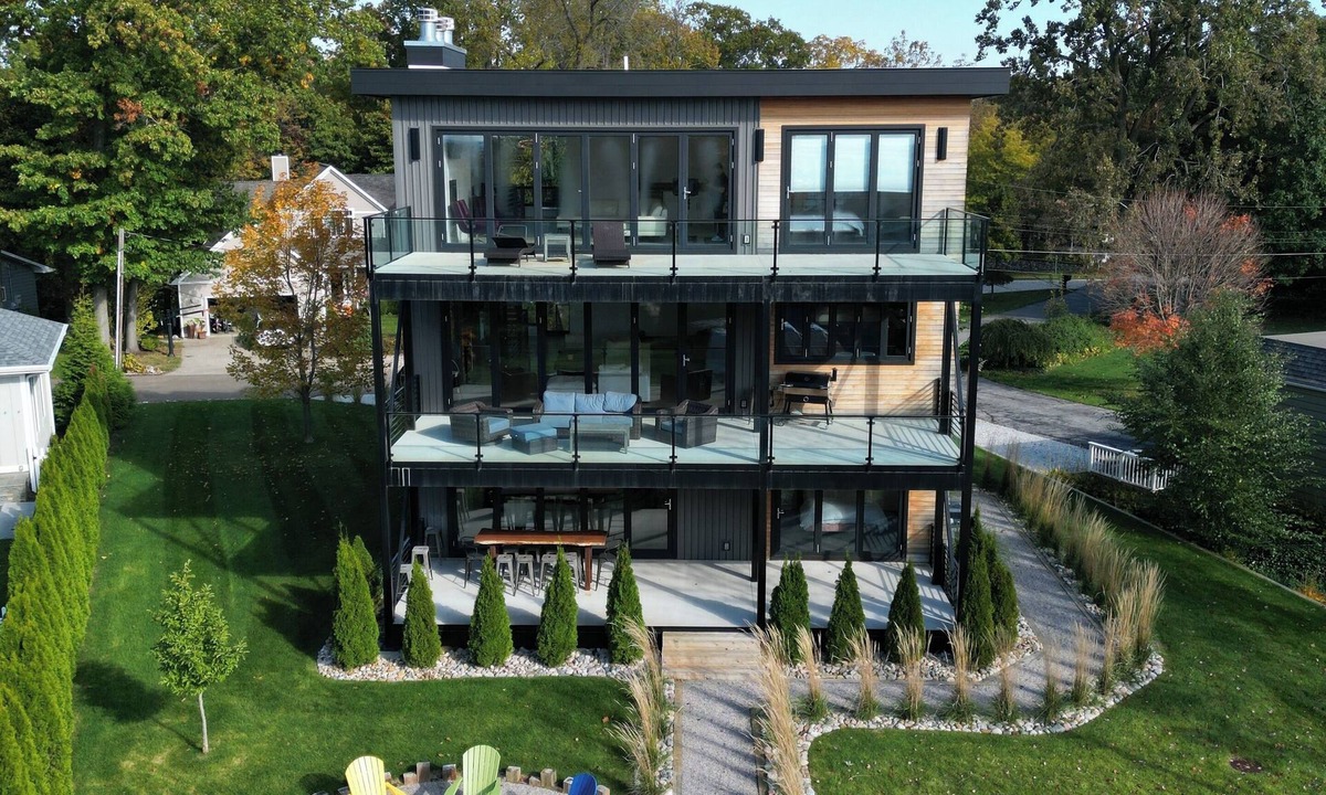 Benton Harbor House | Lake views, Hot tub, Private beach, Fire pit