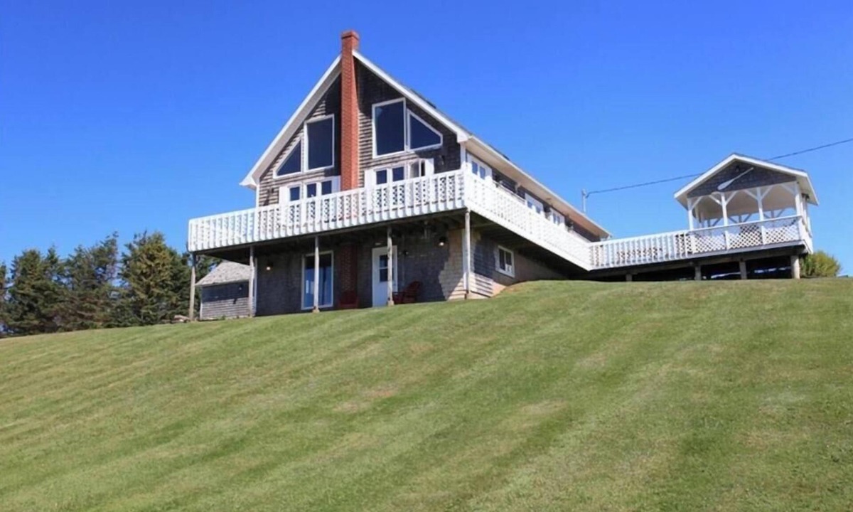 Brae Cottage | Oceanfront PEI Home with Ocean Views, Wraparound Deck & Private Beach