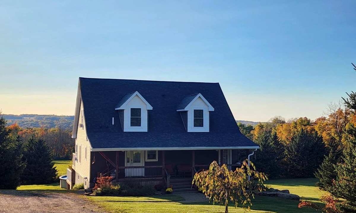Conesus House | Private Finger Lakes Getaway with a Pool, Hot Tub, and Sauna, timber frame porch