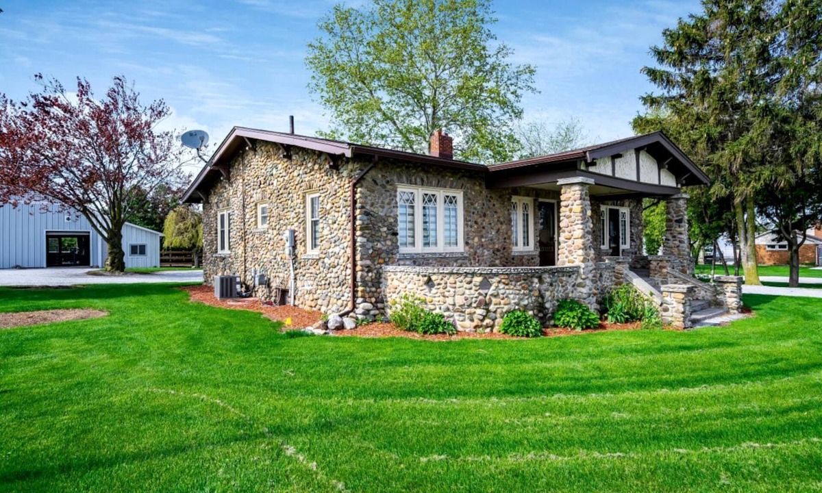 Kingsville House | Stone Farm Retreat with Foosball and Poker Table in Ontario