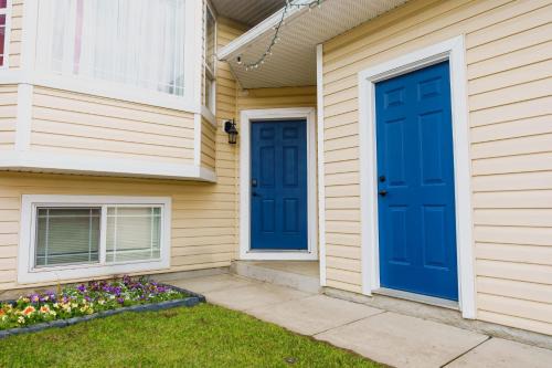 Grande Prairie House | THE BLUE DOOR house with Central AC and garage access