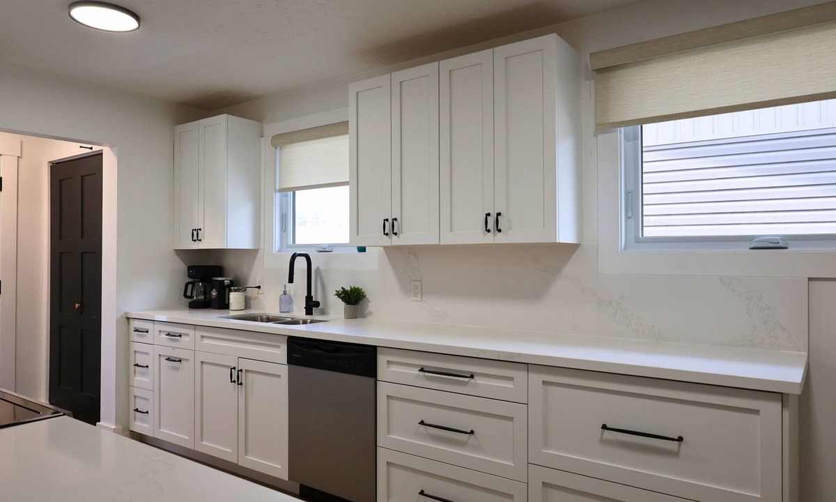Timmins Apartment | The Redbrick Residence - 3 bedroom main floor home with AC + covered patio