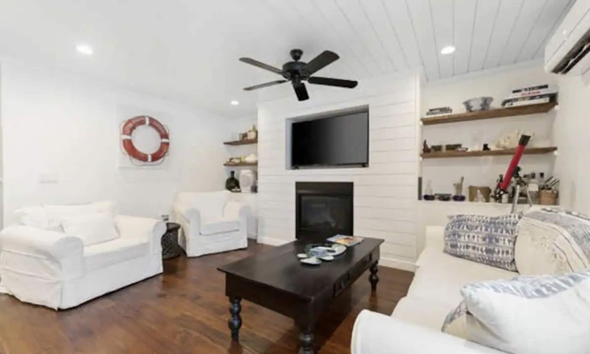Mancelona Cottage | Updated Cabin with Fireplace, Epic Deck, 2 min from ORV trails - Pet Friendly!