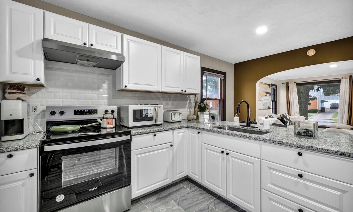 Parma House | Welcome to Chic Parma House, a stylish 5-bedroom, 1-bath home with boutique-inspired design, perfect for families, traveling professionals, and extended stays just minutes from Cleveland, hospitals, and major highways.