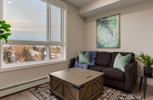 Shaganappi Apartment | $0 Cleaning Fee, Free Parking, King Bed, Top Floor