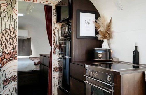 Tyendinaga Mohawk Territory House | 1971 Vintage Modern Airstream with Cowboy Tub