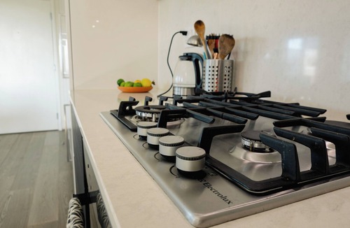 Chinatown Apartment | 2 bed, 2 bath, XL patio, short walk from stadium