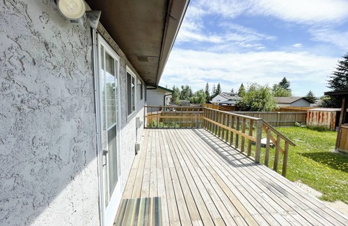 Ranchlands House | 2 Bed rooms, 3 beds with garage for a cozy stay in Calgary