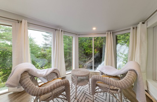 Baie-St-Paul House | A charming little waterfall to go with the spa