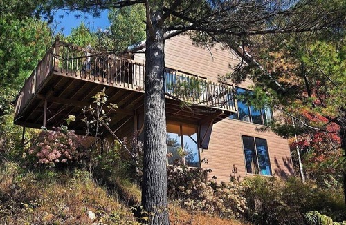 Baie-St-Paul House | A charming little waterfall to go with the spa