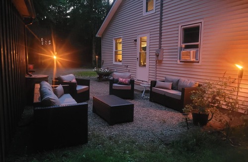 Arcade Cabin | A short walk to a private beach for swimming boating or fishing