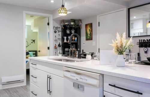 Northeast Edmonton Apartment | Art, comfort, and fun just 15 minutes to downtown and steps from shops