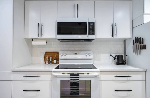 Northeast Edmonton Apartment | Art, comfort, and fun just 15 minutes to downtown and steps from shops