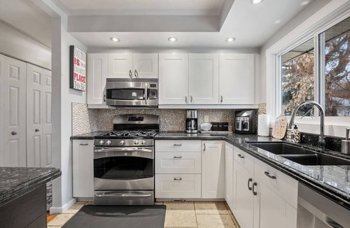 Southeast Calgary House | Bark + Bloom Bungalow | Fenced Yard | Pet Friendly