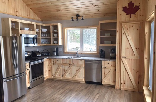 Queens House | Beautyful Chalet with lakefront incl. access to private islands