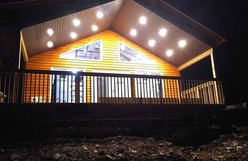 Queens House | Beautyful Chalet with lakefront incl. access to private islands