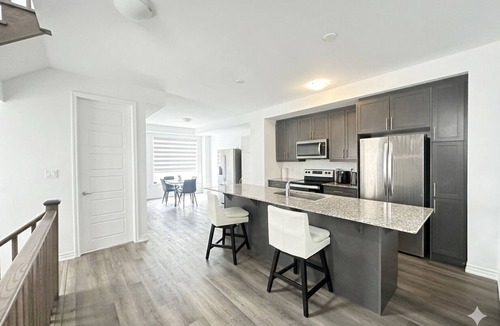 Brampton House | Bedroom (Queen bed) within shared space
