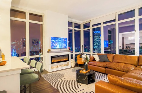 Hell's Kitchen Apartment | Breathtaking NYC Skyline Apartment 2BR 2BA with Fireplace