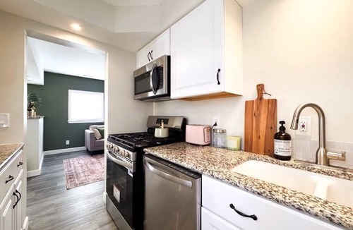 Lakewood House | Central Lakewood Hot Tub Getaway with fenced yard