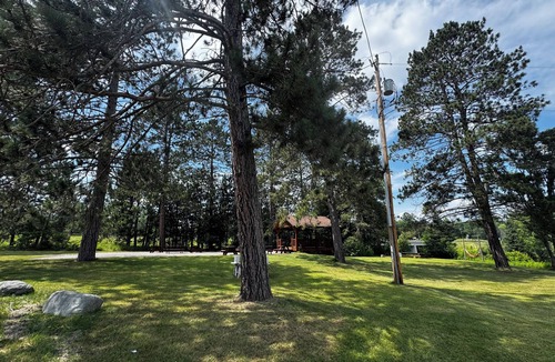 Crystal Falls Cabin | Charming log cabins on Paint River - Pet Friendly!