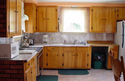 Franklin Cottage | Comfortable Cottage Located Directly On The Water With Large Wrap Around Deck