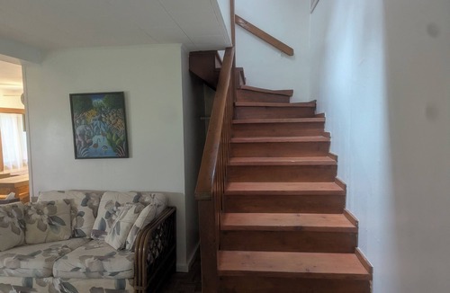 Harbert Cottage | cottage surrounded by field and woods, walking distance to beach