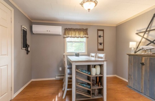 Deerfield House | Country home with cozy fireplace