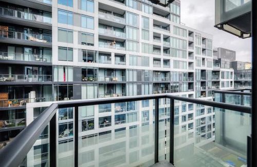 Wellington Place Apartment | Cozy 1BR Downtown Stay with Balcony Views