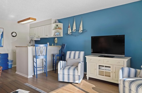 Charlevoix Condo | EWI 117A Waterfront Access | Pool, Hot Tub, Sauna | Sleeps 4