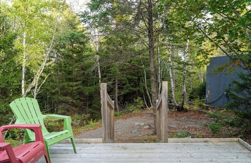 Saint Patrick RV Rental | Explorer Glamping Tent! Forest Retreat & Hot Tubs!
