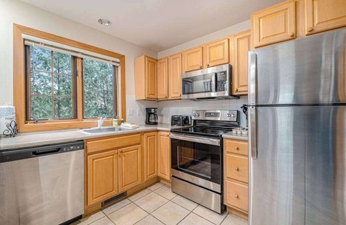 Boyne Falls Condo | Exquisite dog-friendly condo with pool, tennis, hot tub, skiing, & central AC