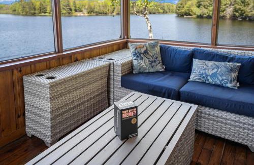 McKellar House | Golden Sunset Retreat with Canoe, Fire Pit & Views