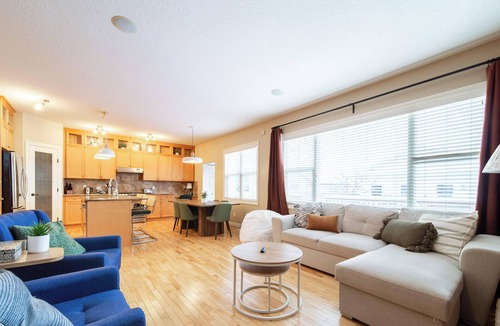 Southwest Edmonton House | Group Retreat near WEM | Hot Tub, 2 Kitchens, 3 Lounges, Fire Table Sleeps 14