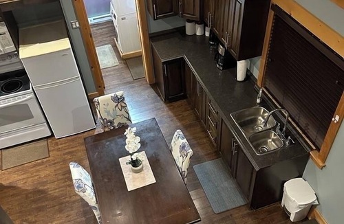 Deer Lake House | Guest House with Playground Sleeps 8 4.2 KMS to Deer Lake Airport & Insectarium