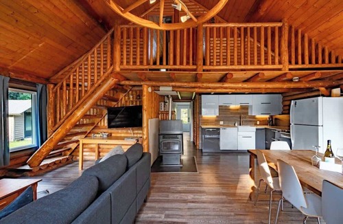 Saint-Leonard-de-Portneuf Cabin | Handcrafted Log Chalet with Hot Tub and Fire Pit