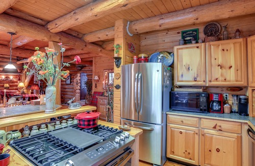 Thompsonville Cabin | Handcrafted Log Home on River Near Crystal Mtn