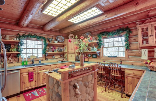 Thompsonville Cabin | Handcrafted Log Home on River Near Crystal Mtn