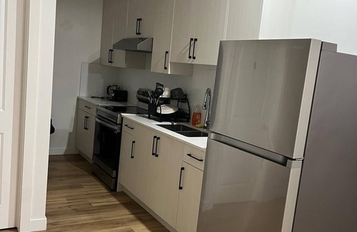 Chestermere House | Homely Comfort Room. Shared washroom with One