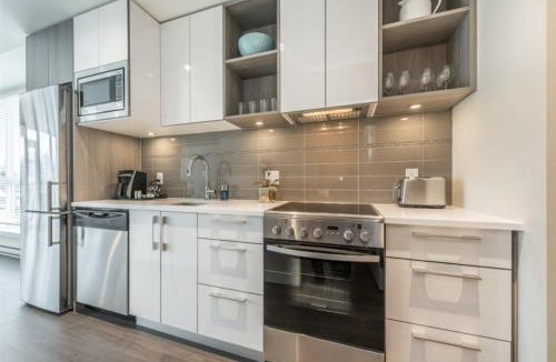 Downtown Victoria Apartment | King Bed And Coastal Art Decor In Old Town