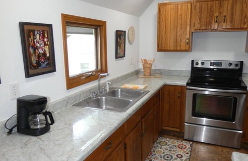 Rapid City Cottage | Lake Breeze on Torch Lake