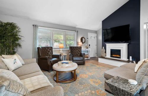 Avon Lake House | Lake Cottage with Hot Tub and Game Room