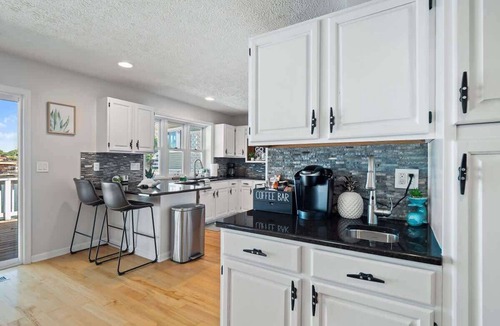 Portage Lakes House | Lake Front - Kayaks - Hot Tub - Sleeps 8