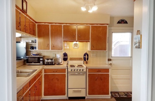 Gypsum House | Lake Front Nautical Themed Home with Private Yard & Sandy Bottom Water Access!