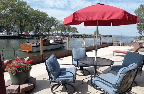 Huron Cabin | Lakefront 1928 Log Cabin w/Sauna, Docking, Fishing, Patio, Big Yard & Balcony