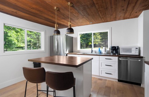 Central Lake Cabin | [Lakefront Cabin] w/sandy private beach, docks, kayaks, sunsets